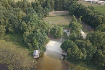 Wohnmobilstellplatz: Strandbereich mit DLRG Haus. - Campingplatz Silbersee Wehdel - Nähe Bremerhaven