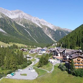 Wohnmobilstellplatz: Alpina Stellplatz mit San. anlage - Alpina Mountain Resort