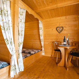 Wohnmobilstellplatz: Kleine Holzhütte für bis zu 4 Personen - Vogtlandcamping