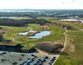 Wohnmobilstellplatz: The stellplatz and the stunning surroundings at CPH Autocamp from above. - CPH Autocamp