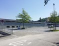 Wohnmobilstellplatz: Ansicht bei Anfahrt - Parkplatz Paul-Grüninger-Station