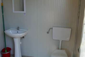 Wohnmobilstellplatz: Toiletten mit heisser Dusche - Agricamping - Agriturismo Petra di Cossu