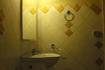 Wohnmobilstellplatz: Toilette / Badezimmer - Agricamping - Agriturismo Petra di Cossu