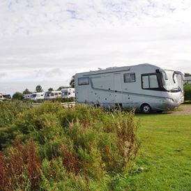 Wohnmobilstellplatz: Das WomoLand-Nordstrand:
Stellplatz- Impressionen - WoMoland Nordstrand