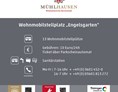 Wohnmobilstellplatz: Informationstafel auf dem Stellplatz mit Kontakten, QR-Code zum Mängelmelder und Preisen - Wohnmobilstellplatz "Engelsgarten" Mühlhausen/Thür.