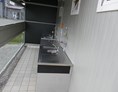 Wohnmobilstellplatz: Dies ist unsere Spülecke die unseren Gästen mit Warm- und Kaltwasser kostenlos zur Verfügung steht. - Wohnmobilpark Füssen