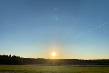 Wohnmobilstellplatz: Sonnenuntergang am SP - Gaststätte Schlupfloch