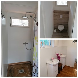 Wohnmobilstellplatz: Sanitärhaus mit 2 WCs, je 2 Dusch- und Waschmöglichkeiten - Kastavenwald