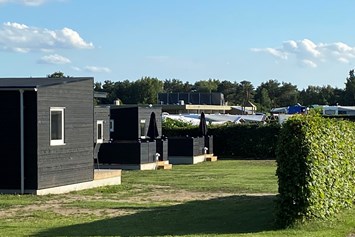 Wohnmobilstellplatz: our luxury cottages for up to 6 persons - DCU-Camping Rågeleje Strand