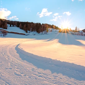 Wohnmobilstellplatz: Rodelhang im Winter - Alpengasthaus Moser