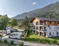 Wohnmobilstellplatz: AlpinLodge und Camping im Sommer - EuroParcs Hermagor · Nassfeld