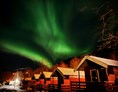 Wohnmobilstellplatz: Northen lights in winter. - Base Camp Hamarøy
