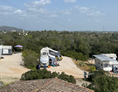 Wohnmobilstellplatz: Camping is build on 4 levels, with 2 pitches on each level. -                The Lemon Tree Villa Apartments & Camping