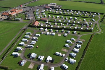 Wohnmobilstellplatz: Aerial view of the distance to the town and Abbey, less than a mile to walk.  - Broadings Farm Caravans and Holiday Cottages