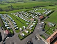 Wohnmobilstellplatz: Aerial view of the distance from the road , and the surroundings - Broadings Farm Caravans and Holiday Cottages