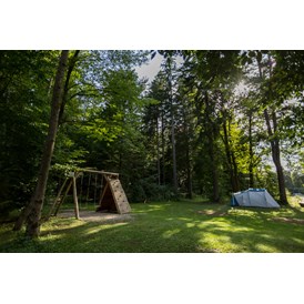 Wohnmobilstellplatz: Our main meadow with rental equipped tents. - Forest Camping Mozirje
