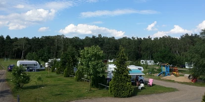 Parkeerplaats voor camper - Frischwasserversorgung - Groot-Polen - geräumige Stellplätze. - Camping de Kleine Stad