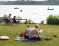 Wohnmobilstellplatz: Strand direkt am Campingplatz mit Sand oder Rasen, im Sommer mit Rettungsschwimmer vor Ort - CampingPlatz Ecktannen